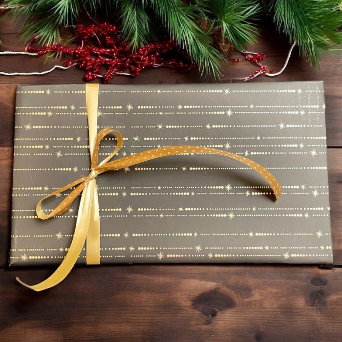 Julpapper B 50 cm. Svart m/stjärnfall. 100 mtr *