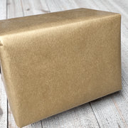 Presentpapper B 38 cm. Guld, matt, kraftpapper. 200 m.