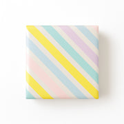 Presentpapper B 50 cm. Randigt pastell, bestruket papper. 100 mtr.
