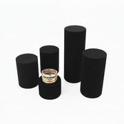 Smyckedisplayer. Set med 5 cylinderformade smyckedisplayer i svart flock.